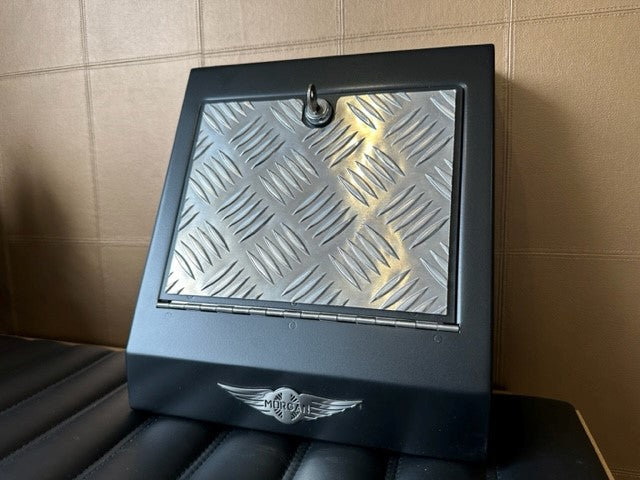 Footwell storage locker